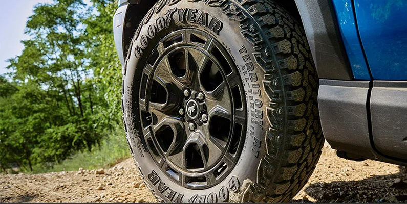 A close up photo of the front drivers side tire of a 2025 Ford Bronco Sport.